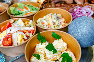 Festive gathering featuring delicious dishes and vibrant salads