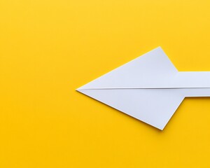 Abstract White Paper Airplane on Yellow Background Minimalist Design