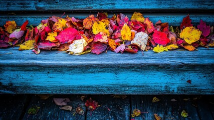 Fototapeta premium Autumn Leaves on Rustic Blue Wooden Bench