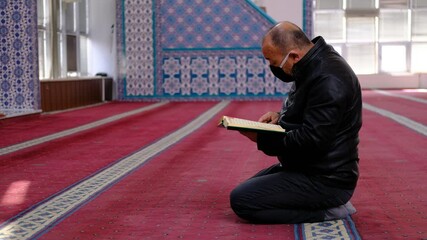 The Man Who Reads the Quran During the Time of the Virus - Powered by Adobe