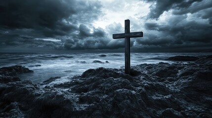 A single wooden cross standing alone on rocky terrain under a stormy sky, symbolizing the sacrifice of Good Friday, with copy space.