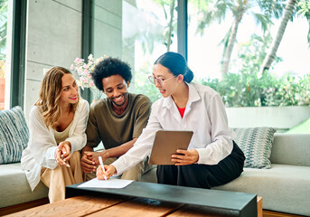 contract woman man signing couple investment house agent real estate business agreement client office home property meeting mortgage document insurance businesswoman