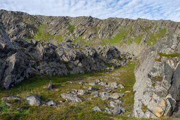 Fototapeta premium Hillside with special rock formations. Varanger Peninsula, Norway