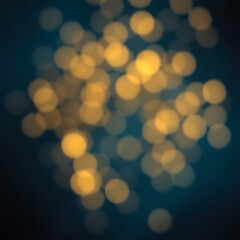 Abstract blurry golden lights on dark blue background.