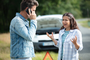 man arguing on the cellphone with car insurance service