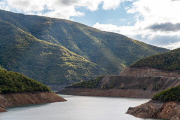 Reservoir Landscape Among Green Mountains
