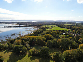 dramatic aerial panorama of Upton Manor house and park on the edge of Poole Harbour