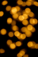 Fototapeta premium golden bokhe at night,Beautiful blurred light bokhe for background material.