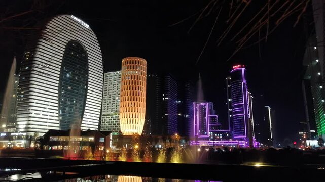 Modern architecture of Batumi illuminated at night