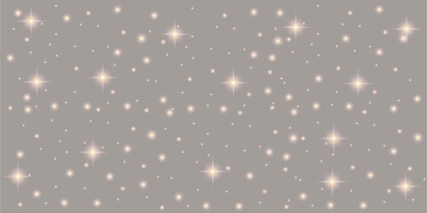 Gold particles on a grey background. Background or design element. Glitter for holiday backgrounds