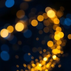 Obraz premium Abstract gold and blue bokeh lights on black background.