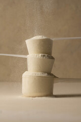 Protein powder in a measuring scoops
