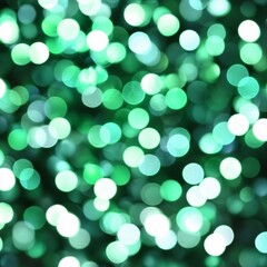 Obraz premium Abstract Green Bokeh Lights Background Texture