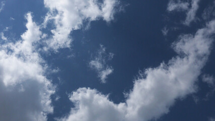 Fototapeta premium White clouds scattered in the blue sky