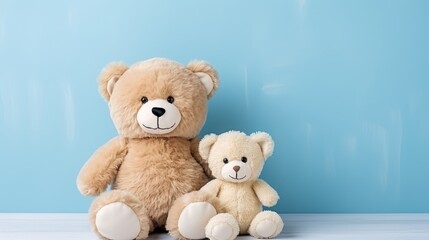 Obraz premium Two Adorable Teddy Bears Sitting Side by Side against a Soft Blue Background Perfect for Children's Themes and Cozy Home Decor