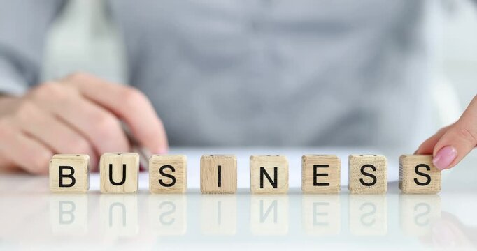 Capture the true essence and spirit of business development using scrabble tiles that spell BUSINESS.