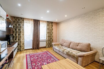 standard interior apartment. living room with sofa