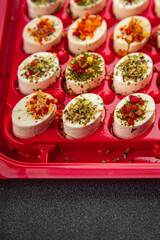 cheese appetizer soft cheese with herbs and tomatoes pieces fresh tasty food dish delicious gourmet food background on the table rustic food top view copy space