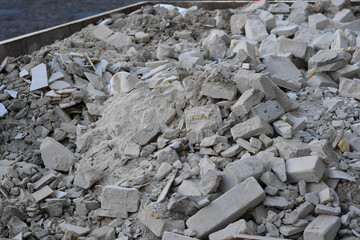 Renovation of a house, building waste rubble in a container