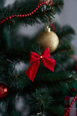 red decorations on the Christmas tree