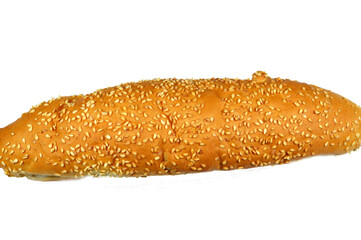 Long sesame bun bread, a fresh baked loaf of bread French Fino ready to fillings, typically filled with savory fillings, made from a dough of flour, milk, yeast, butter, selective focus