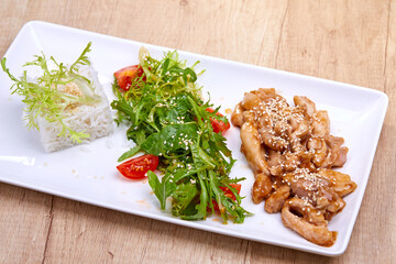 fried chicken with sald and rice