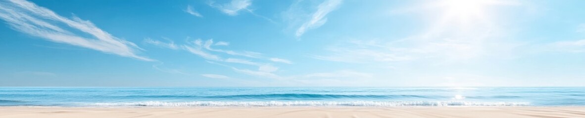 Obraz premium Serene Beach Scene with Clear Blue Sky and Ocean
