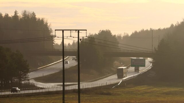 Stockholm, Sweden Traffic and landscape on the E4 highway north of the city in the winter light. 