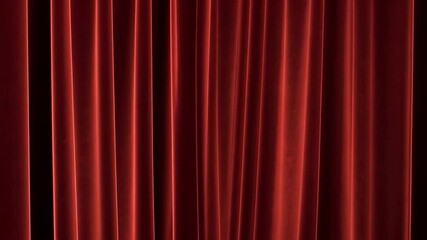 Crimson Curtain: Rich, deep red velvet curtains hang in elegant vertical folds, creating a dramatic and luxurious backdrop perfect for theatrical productions or sophisticated events.