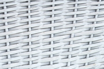 White wicker basket pattern. Bright wooden weave design. Intricate craftsmanship and geometric weave texture. Grid pattern. Mesh background.	