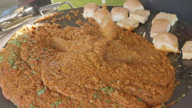 Cooking Pav Bhaji on a Tava: Preparing a Delicious Indian Street Food Dish
