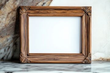 Beautiful vintage wooden picture frame resting on a marble surface with elegant, intricate carvings highlighting its charm