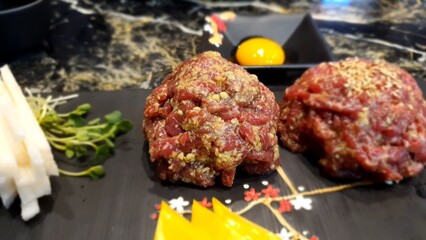 Korean traditional food. Beef yukhoe, Korean style raw beef