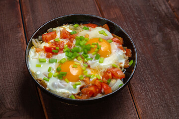 Shakshuka Jewish dish with egg and spicy tomatoes