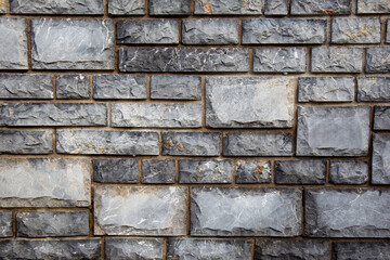 Fototapeta premium Background of dark gray stone wall textured 