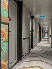 Cabin suite stateroom corridor aisle hallway onboard modern luxury ocean cruiseship cruise ship...