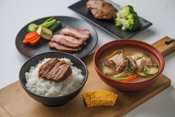 Delicious Asian Cuisine Meal Presentation With Rice And Soup