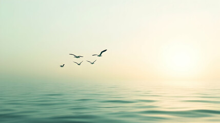 Seagulls flying over calm ocean at sunrise; peaceful background, perfect for travel or nature websites