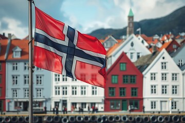 Flag of Norway on the background of colorful houses in Bergen, Norway
