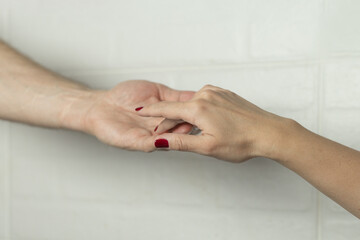 a woman's hand in a man's palm, love concept
