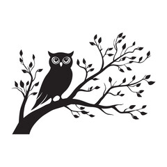A black owl is perched on a tree branch