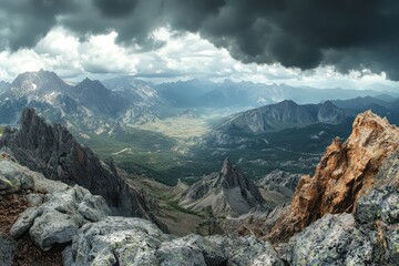 A dramatic landscape with jagged mountains and a stormy sky.