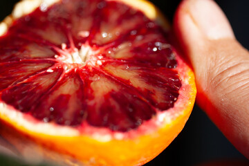 Macro detail of the inside of a blood orange, Citrus sinensis, Red Orange