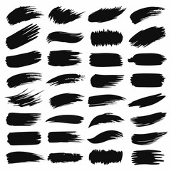 Fototapeta premium A collection of twenty black brush strokes of varying shapes and sizes on a white background.