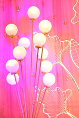 lights balls. event stage decoration. pink colors. 