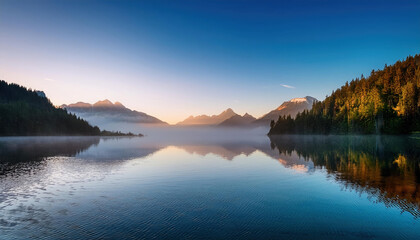 tranquil lake reflecting misty mountains at sunrise, symbolizing calm and balance