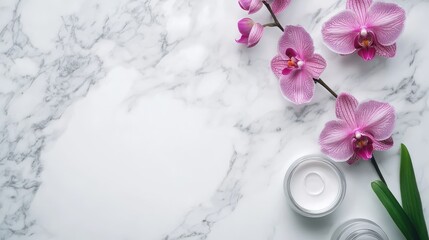 Obraz na płótnie Canvas Pink orchid flowers and cream jars arranged on a marble surface with Copy Space for text.