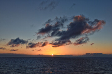 Nordic Ocean Sunrise of the coast of Norway from boat, Summer 2024, Scandinavia, Europe.
