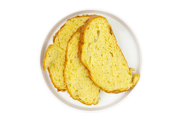 Freshly baked golden corn bread slices arranged neatly on a plate, isolate on white, ready for serving during breakfast or a special meal occasion.