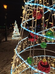 Christmas lights on the streets . Christmas decorations.